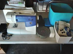 lot 9 image: Huskystar 219 Portable Sewing Machine With Notions, Accessories & Cover