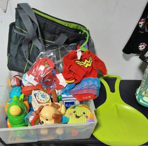 lot 36 image: Toys, Chicco Bag, Little Sled, 6-12 Mo. Wonder Woman Costume