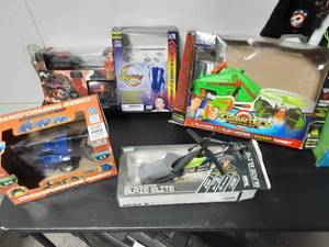 lot 37 image: Bin Of Toys, Wall Cars, RC Cars, Helicopter, Hovertech Target Game