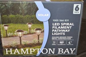 lot 51 image: NEW - Hampton Bay Ashburn 12 Lumens Golden Bronze Spiral Filament LED Outdoor Solar Path Light(6-Pack)