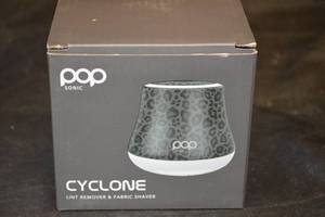 lot 60 image: Pop Sonic Cyclone Lint Remover and Fabric Shaver - Black and Grey Leopard Print