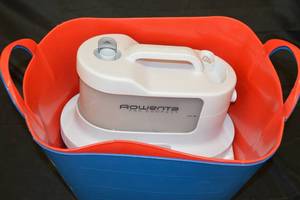 lot 114 image: Rowenta Pro Compact Garment Steamer with Tote Bins