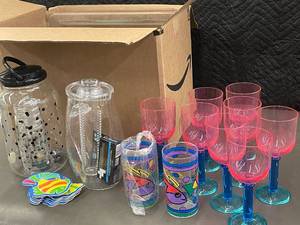 lot 21 image: Box of Plastic Party plates glasses water pitchers etc                    F3