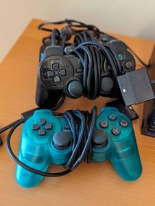 lot 96 image: PlayStation 2 Console and Controllers