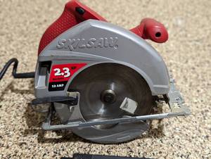 lot 69 image: Skill Saw and Drill