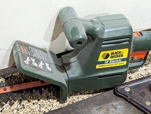 lot 59 image: Variety of Hand Saws and Electric Trimmer