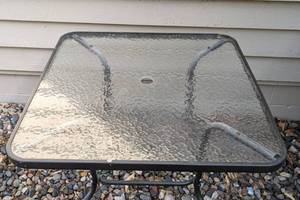 lot 52 image: Small Glass Topped Patio Table