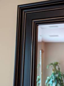 lot 22 image: Black and Gold Wall Mirror
