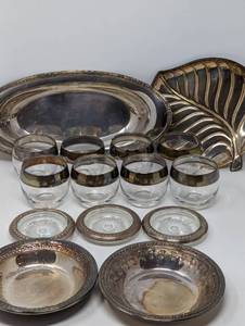 lot 35 image: Silver group low balls with silver trim, crystal coasters with silver trim, Reed & Barton Silver plate, Oval Tray, leaf tray (plated)