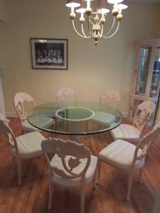 lot 22 image: Large Round Glass Dining Table with beveled edge and 7  Italian Beechwood Dining room chairs