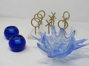 lot 37 image: Blue Oleg Cassini signed votives, Lucite Tic-Tac-Toe table game, pulled blue blown glass