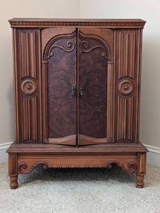 lot 58 image: Charming Companion Vintage 2-Door Cabinet Perfect for Sewing Supplies