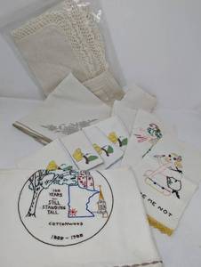 lot 87 image: Vintage Charm Ivory Tablecloth with Delicate Lace Border plus  cotton embroidered dish towels, hand towels, luncheon napkins, Pot (hot) pad holders