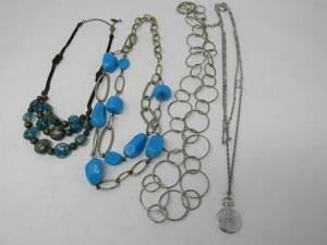 lot 82 image: Colorful Charm Multi-Strand Necklaces  with bonus necklace Standrack