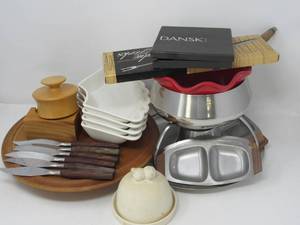 lot 85 image: Fondue Fun Everything You Need for a Melty Party plus bonus danish wood handled knives dansk forks california pottery plates