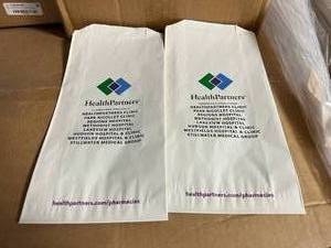 lot 7 image: MSRP $1500  10 Cases (2,000 bags per case) NEW Private Label HealthPartners Disposable Pharmacy RX Prescription Bags (only 1 case is pictured but there are 10 cases)