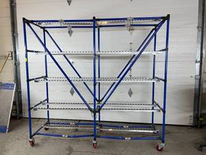 lot 77 image: WOW MSRP $4000 Like New Industrial Modular Material Handling Flow Rack Storage Shelving Unit System Cart With Double Sliding Rolling Tracks On Almost Each Shelf&nbsp Speed Up Operations With This Flow Racking - A Couple Bends On Bottom Pipes