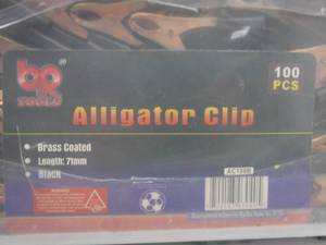 lot 3 image: Brass Coated Alligator Clips  Approximately 100 Pieces In Container 