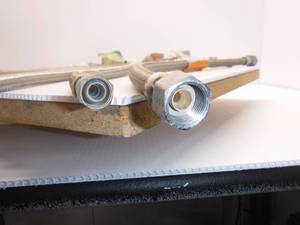 lot 28 image: Assorted Faucet Connectors  Approximately 10 Pieces 