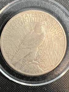 1925 US PEACE SILVER DOLLAR IN AIRTITE