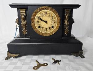 lot 12 image: Antique Black Mantle Clock