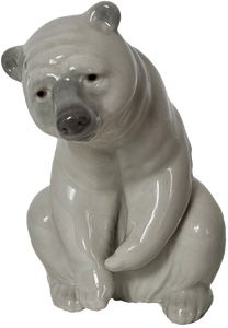 lot 7 image: Lladro Polar Bear Resting Porcelain Figurine