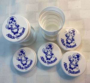 lot 32 image: Vintage Alka-Seltzer Collapsible Cup Pill Holder and Travel Cup - 5 Total