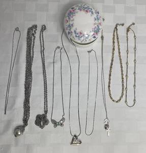 lot 41 image: Silver toned jewelry lot and Wedgewood Bone China Jewelry Dish with Lid