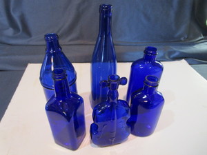 lot 77 image: Cobalt Bottles