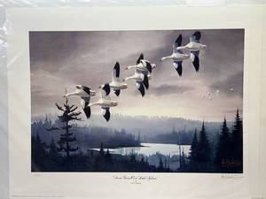 lot 22 image: Les C. Kouba-Signed Numbered Print Snow Geese Over Lake Sylvan