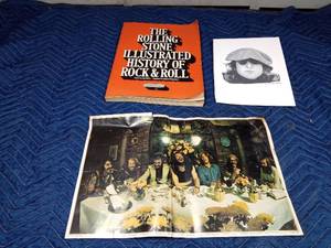 lot 34 image: Rolling Stones book of rock n roll and musicians posters