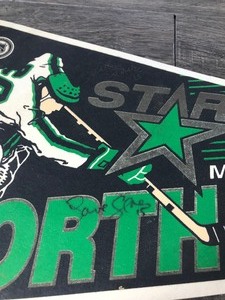 lot 395 image: Vintage Minnesota North Stars New Star Logo Hockey NHL Autographed Felt Pennant