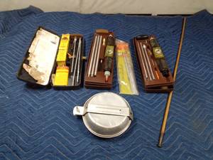 lot 315 image: 3 Gun cleaners, mess kit and black powder rod