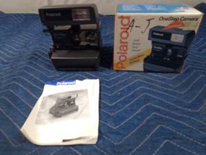 lot 312 image: Vintage one-step camera with instructions in box