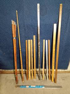 lot 303 image: Pool stick, Bamboo rod, Advertised yard sticks and more