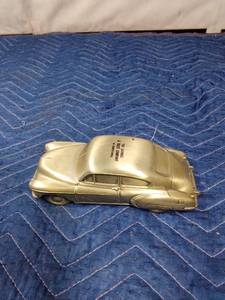 lot 266 image: The savings and Trust Co, metal car bank