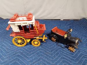lot 267 image: Metal wind-up musical car and wooden coach