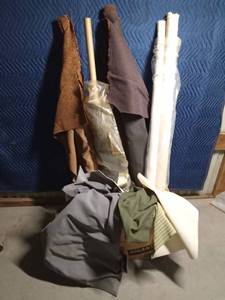 lot 234 image: 5 partial rolls of upholstery material and box of pieces
