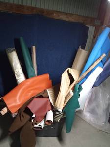 lot 235 image: Tote of partial rolls and pieces of upholstery vinylcanvas