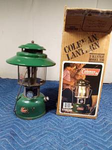 lot 53 image: 1974 Coleman lantern and Coleman box