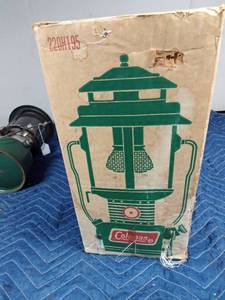 lot 48 image: Coleman lantern and box