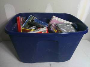 lot 21 image: Bin of Mixed Media CDs DVDs Blue Rays