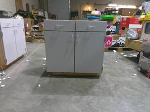 lot 57 image: (34.5 H x 36 W x 24.5 D) 2 Drawer 2 Door Base Cabinet