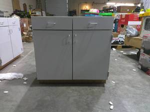 lot 58 image: (34.5 H x 36 W x 24.5 D) 2 Drawer 2 Door Base Cabinet
