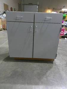lot 63 image: (34.25 H x 34.25 W x 23.25 D 19.25 D-Shallow Section) 2 Drawer 2 Door Base Cabinet