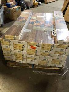 Pallet of TrafficMaster Lakeshore Pecan 7 mm T x 7.6 in. W Laminate Wood Flooring (24.2 sqftcase)  Customer Returns See Pictures
