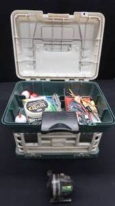 lot 26 image: PLANO TACKLE BOX WITH TACKLE, A CENTURY JOHNSON BUTTON REEL, AND A CORK HANDLE SHAKEPHERE ROD