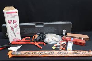 lot 45 image: GUN GAURD GUN CASE, GUN GARD DOUBLE CLAY PIGEON HAND THROWER, SAFTEY HARNESSES, VINTAGE GUN CLEANING KITS, AND MORE