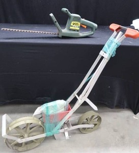 lot 47 image: BLACK AND DECKER 16 ELECTRIC HEDGE TRIMMER AND A PRECISION GARDEN SEEDER