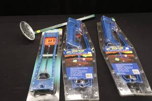 lot 62 image: 3 BRAND NEW TIP UPS AND A NEW ICE SCOOP